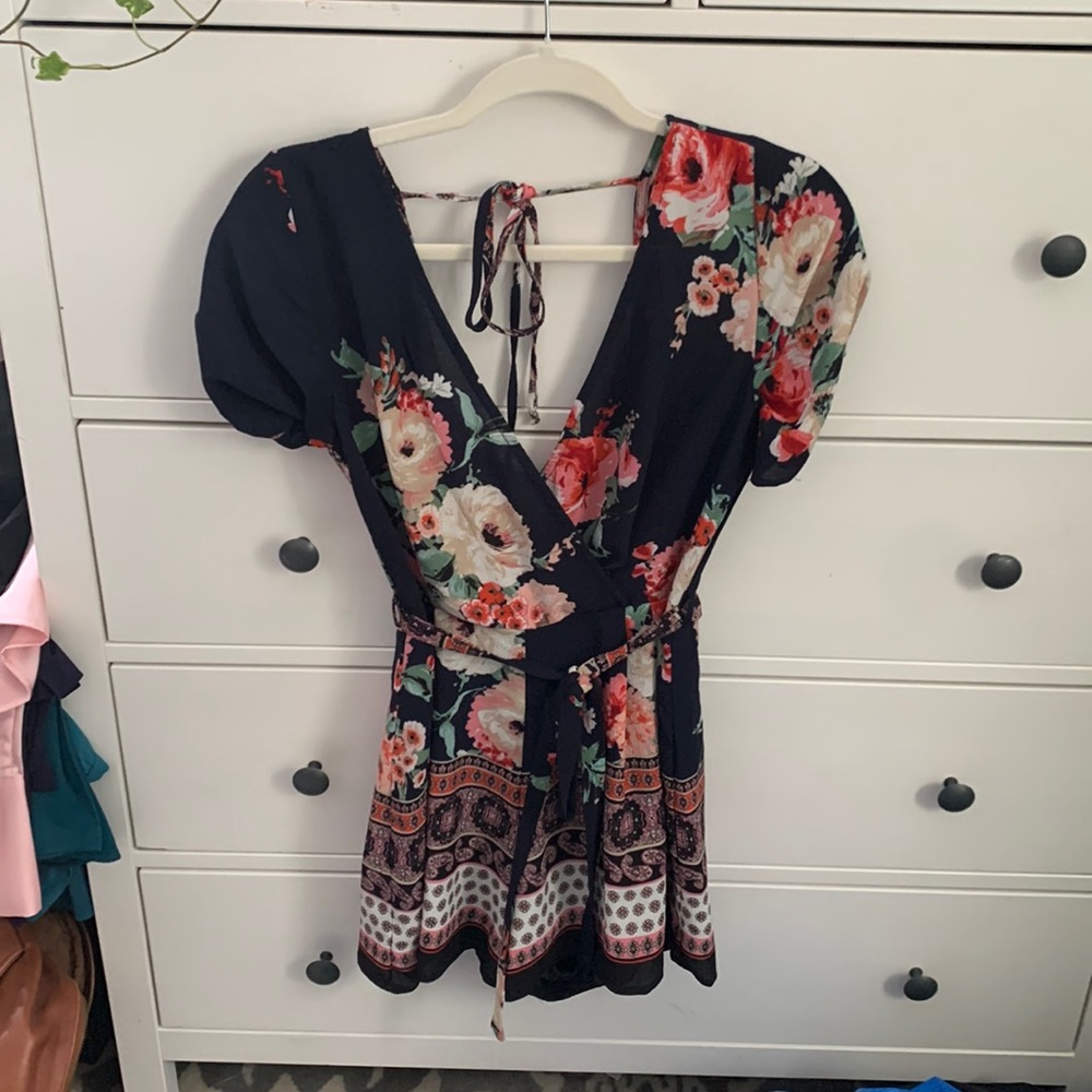Multi patterned navy blue romper size small!